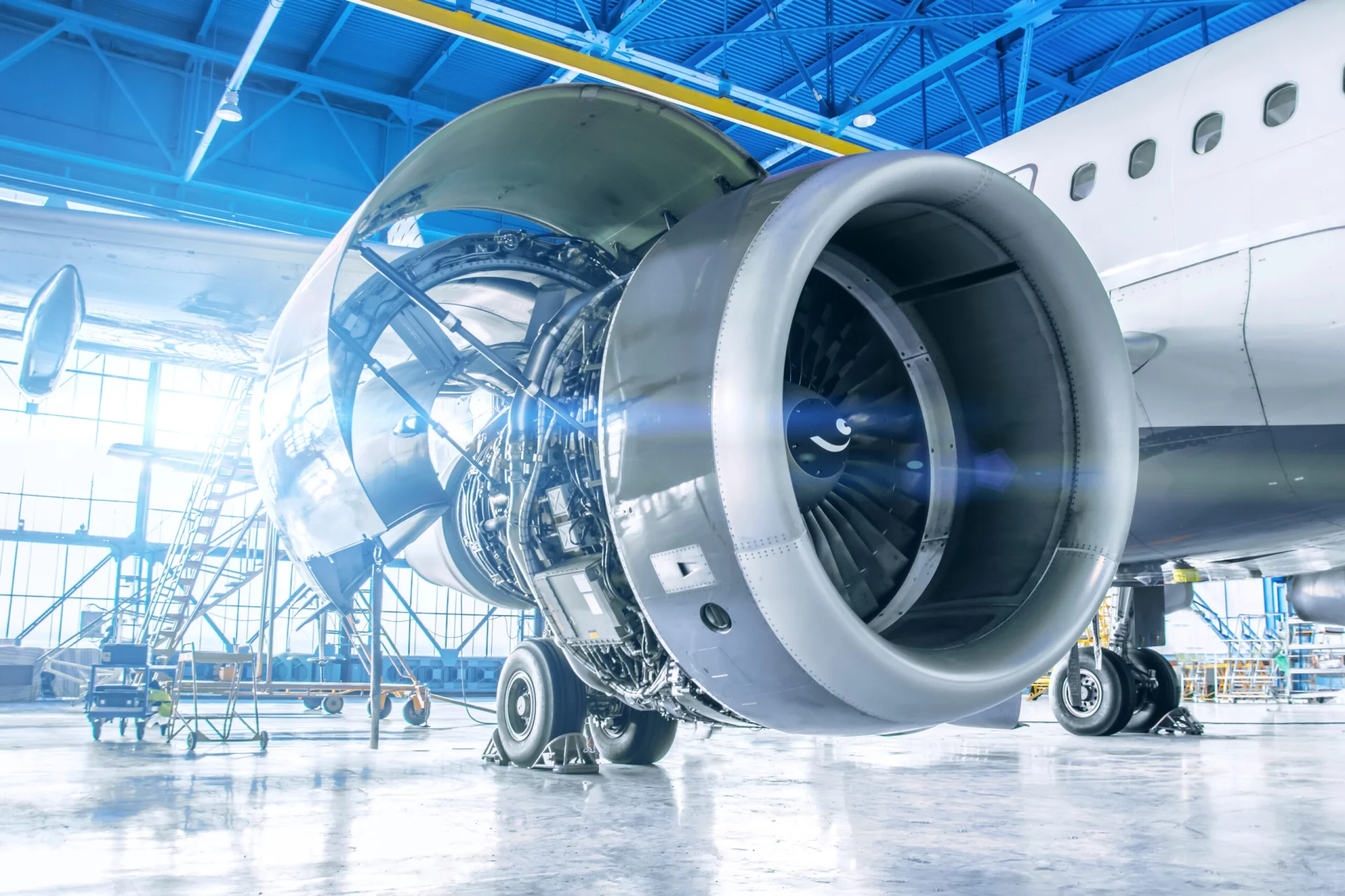 airplane being constructed in airplane hangar