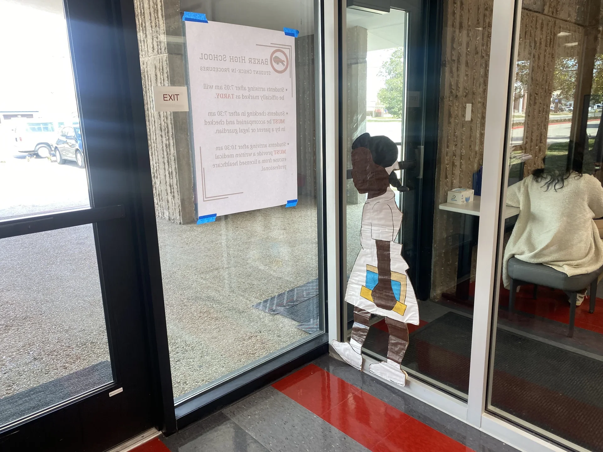 hand painted Ruby Bridges cutout in BHS window