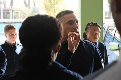 a group leader giving a speach